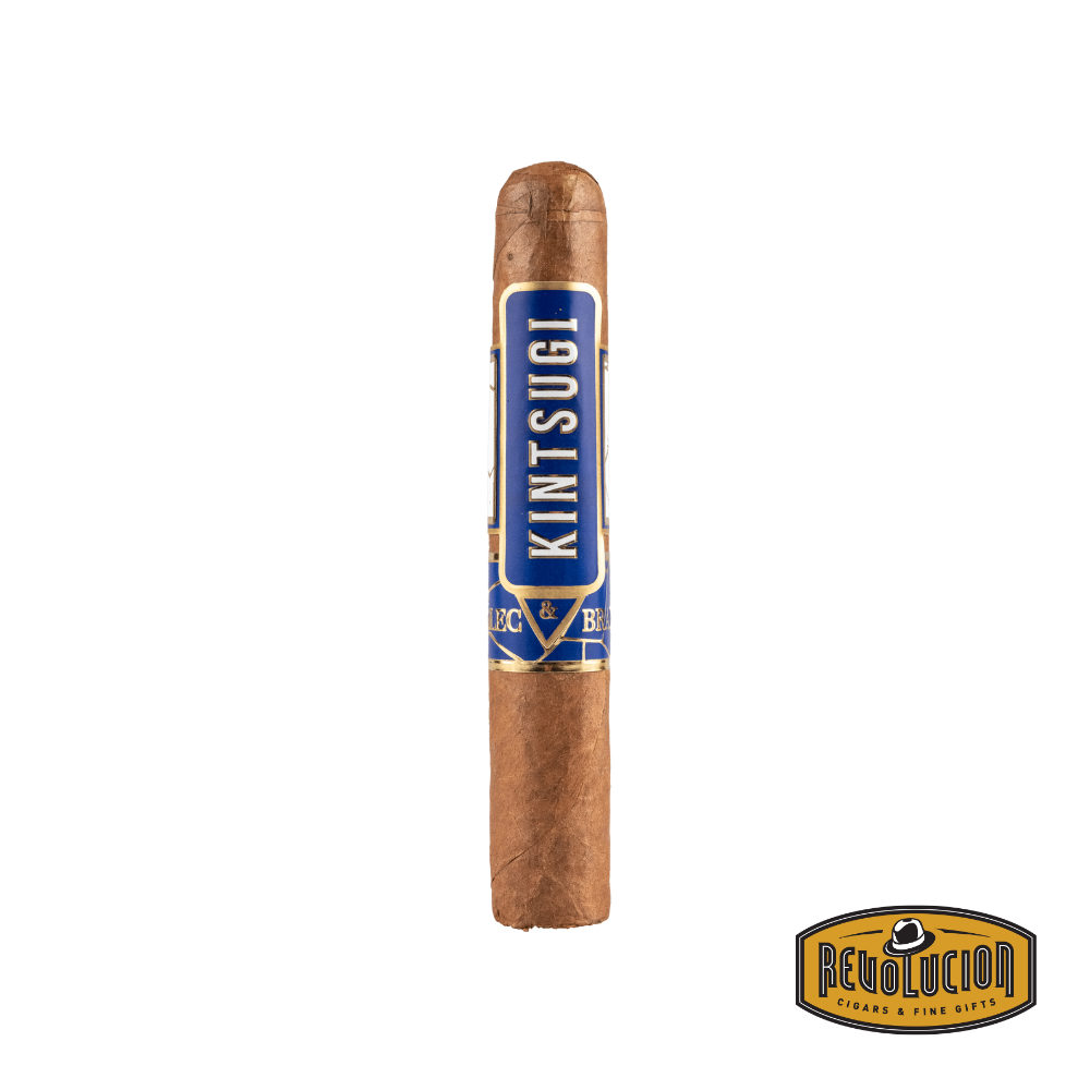Alec Bradley Kintsugi Robusto Medium-Full Strength Honduran Cigar displayed on a white background with the Revolucion logo, highlighting its dark, oily wrapper and elegant band inspired by Japanese craftsmanship.