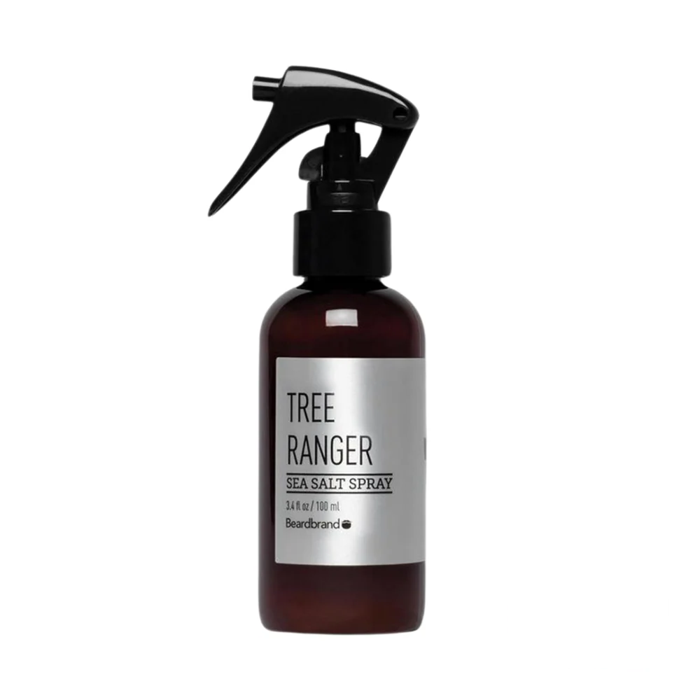 A bottle of Beardbrand Seasalt Spray in the Tree Ranger scent, designed to add texture and volume to hair and beard with a refreshing, woodsy aroma.