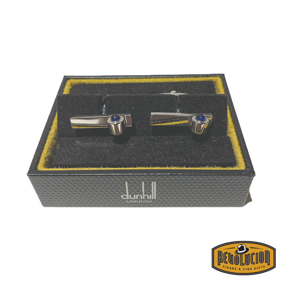 Elegant Blue Ruby Dunhill cufflinks featuring deep blue gemstones set in a polished metal frame, viewed from the front to highlight their refined craftsmanship.