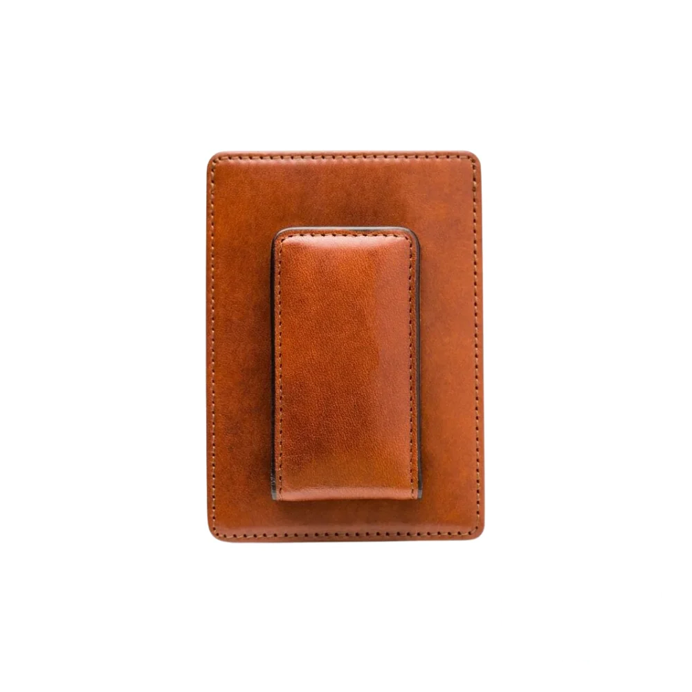 Back view of the Bosca Deluxe Front Pocket Wallet in amber leather, highlighting its smooth texture and elegant stitching for a timeless and durable finish.
