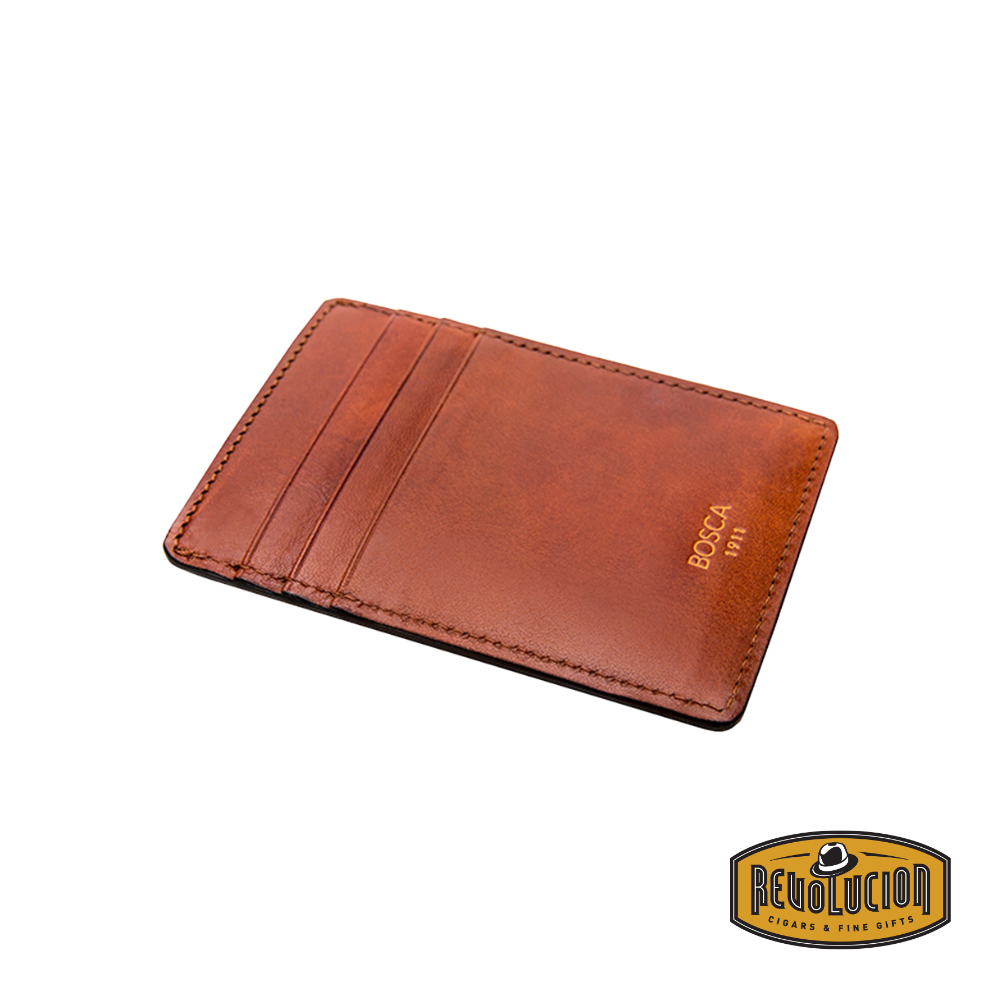 Bosca Deluxe Front Pocket Wallet in rich amber leather, featuring a slim and refined design for effortless front-pocket carry.