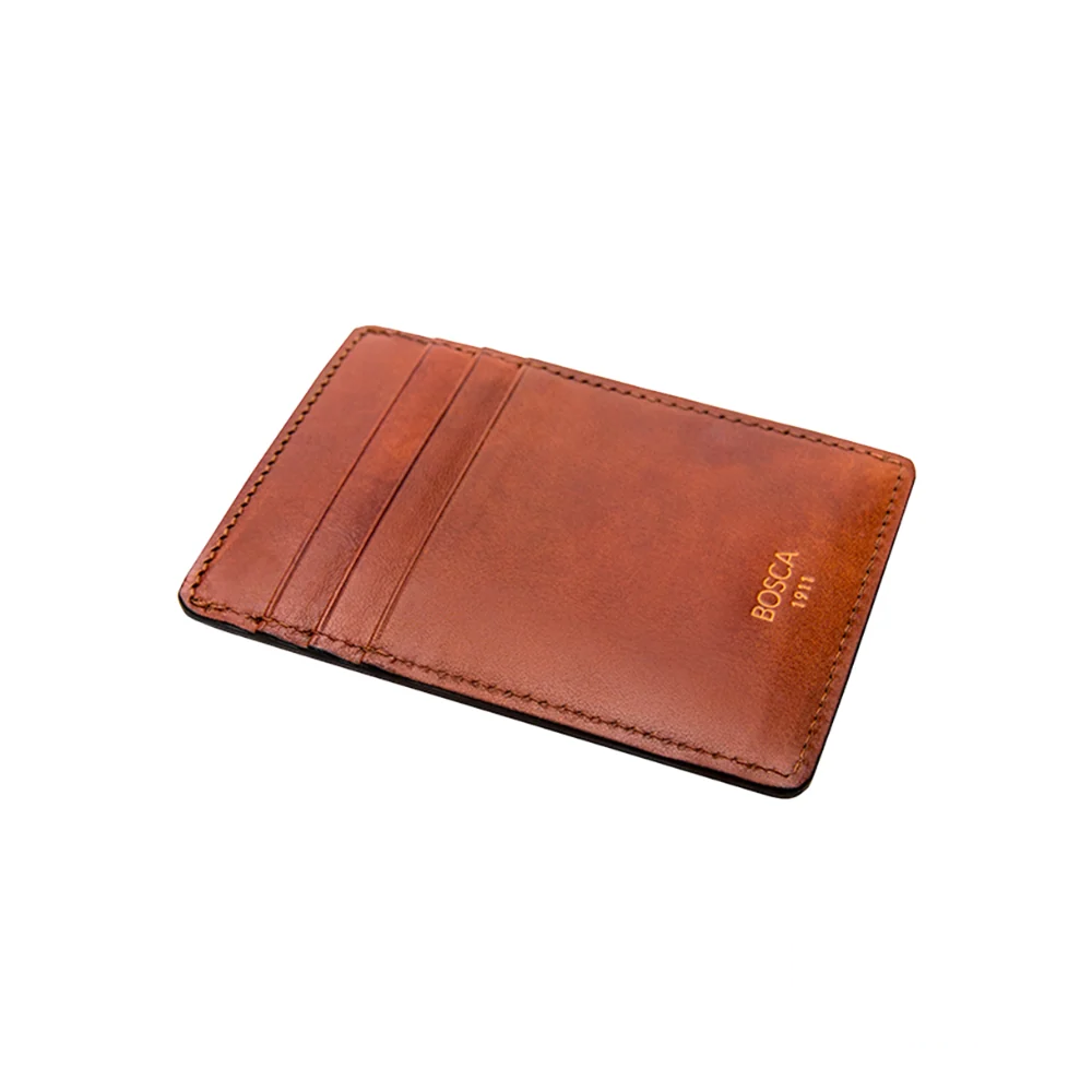 Bosca Deluxe Front Pocket Wallet in rich amber leather, featuring a slim and refined design for effortless front-pocket carry.