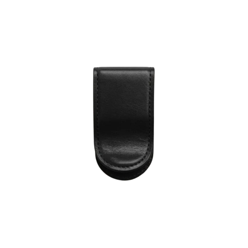 Bosca Leather Covered Money Clip in Black, featuring a sleek and compact design with high-quality black leather wrapping around a sturdy metal core. A refined accessory for securely holding cash with a touch of sophistication.