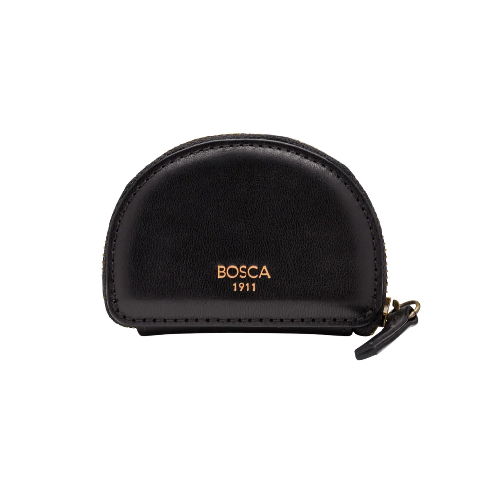 Black leather Bosca coin purse with a secure zipper closure, featuring a key fob attachment for added functionality, shown in a sleek and modern design.