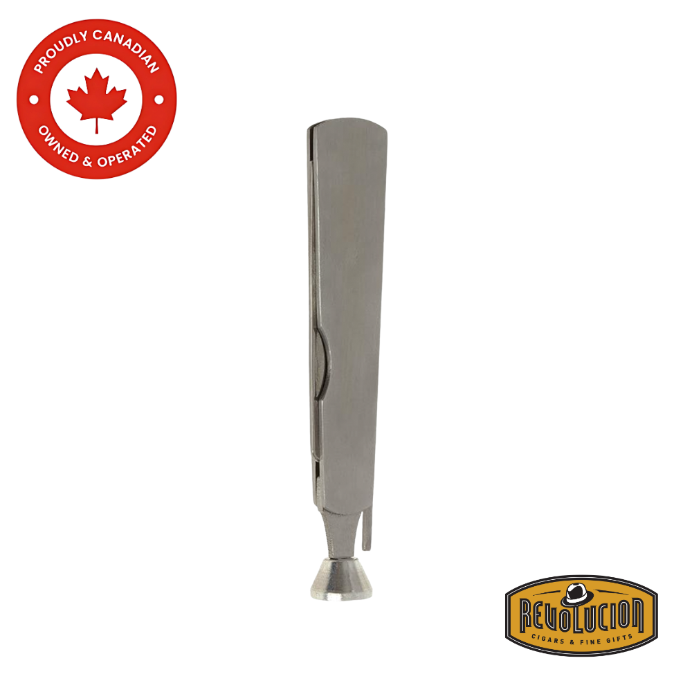 Silver metal pipe tool standing upright in its folded position. Revolucion Cigars & Fine Gifts logo in the bottom corner.