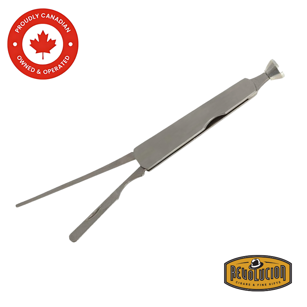 Silver metal pipe tool fully extended, showcasing the tamper, reamer, and scraper components. Revolucion Cigars & Fine Gifts logo in the bottom corner.