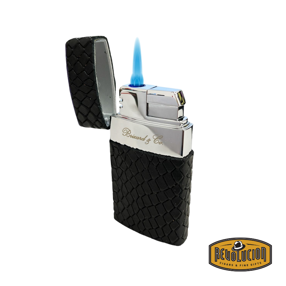 Brizard & Co Venezia Single Flame Lighter in Black Python & Purple, shown ignited with its precision single flame burning brightly.