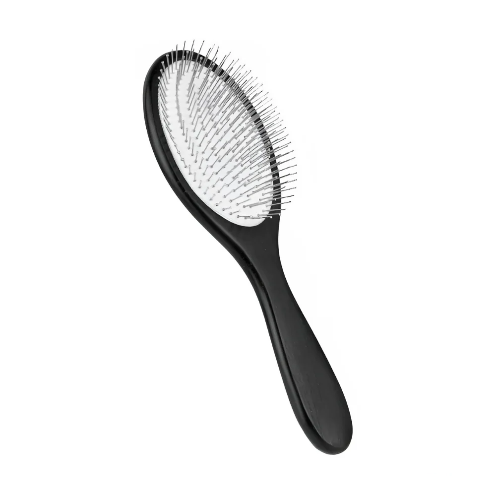 Brosse Éminence Metal Brush in a sleek black and white design, featuring a durable metal frame and ergonomic handle for effective hair grooming.