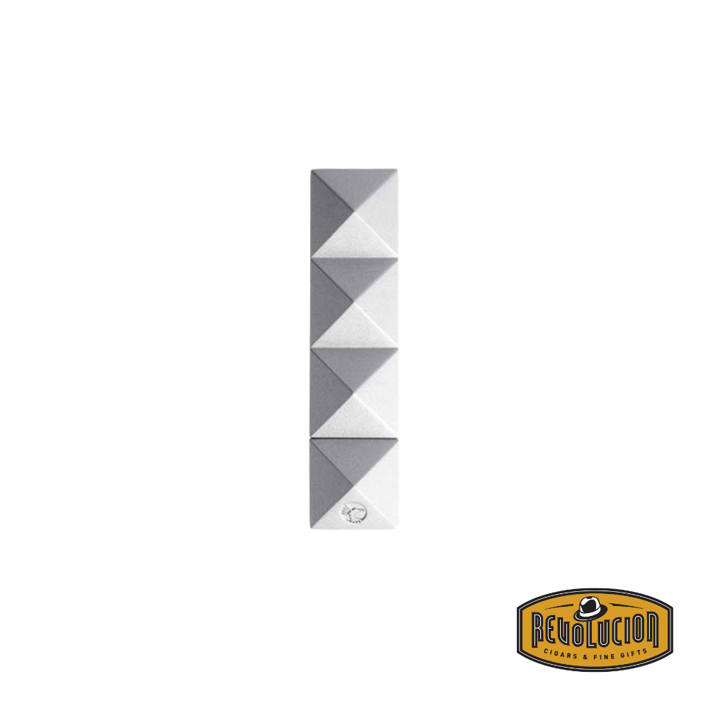 A stylish Colibri Quasar Cigar Punch in silver, showcasing its modern, textured design with the signature Quasar pattern.