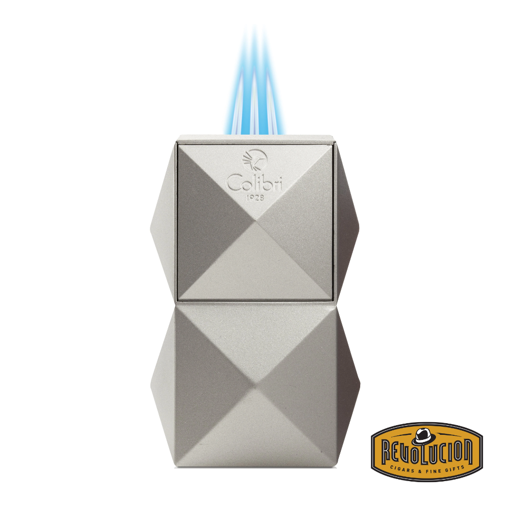 Colibri Quasar Triple Flame Table Lighter in Silver with triple flames burning for an even cigar toast.