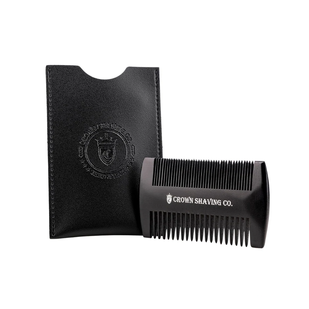 Crown Shaving beard comb placed beside its elegant black leather case.