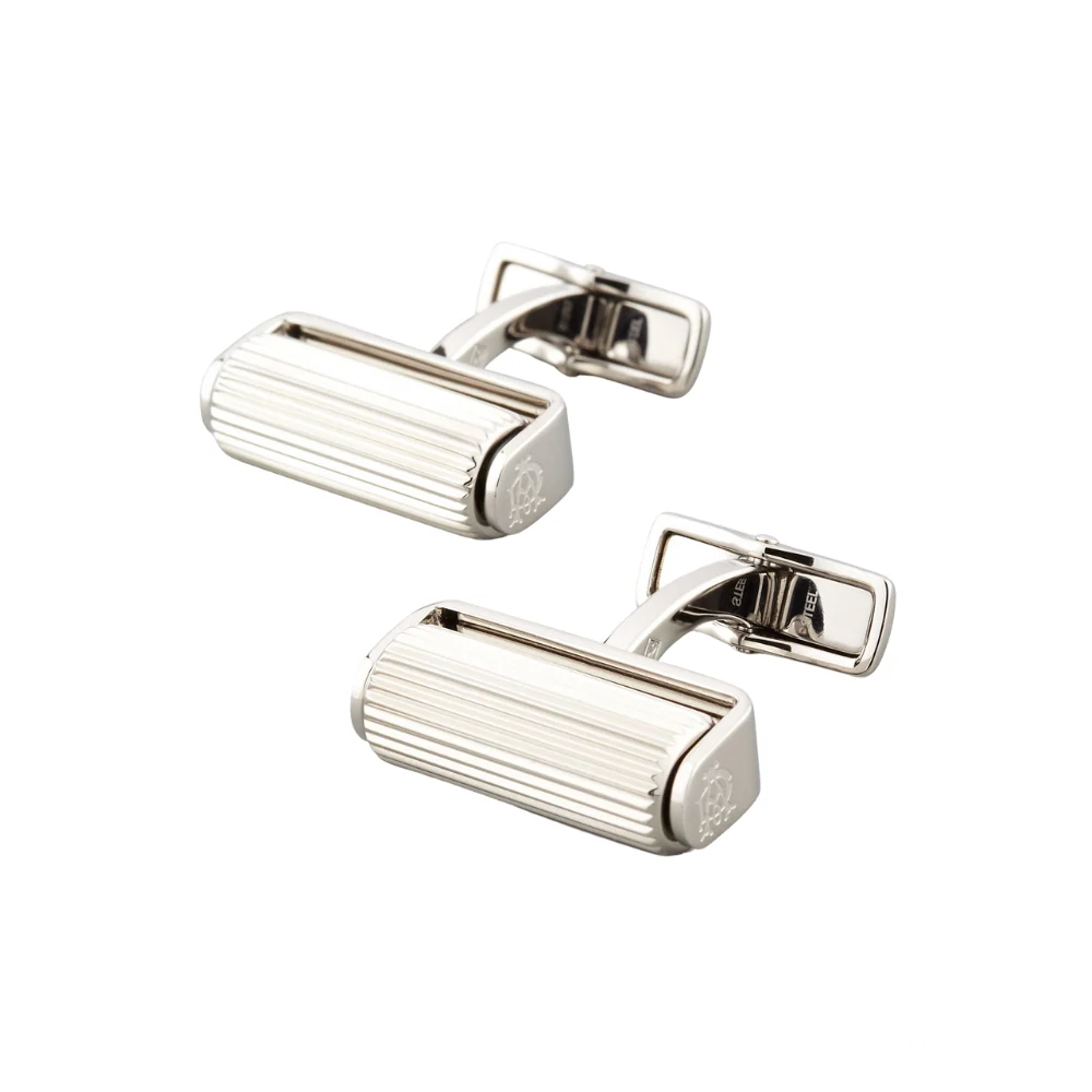 Dunhill cufflinks with a sleek silver-tone roller design, showcasing a modern and sophisticated aesthetic.