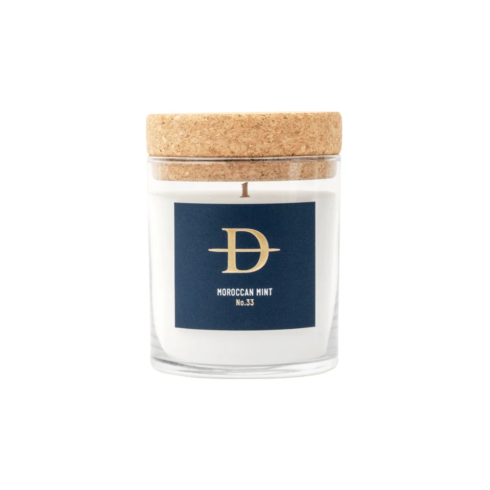 Daneson Moroccan Mint Candle in an elegant glass container, offering a refreshing and soothing mint aroma.