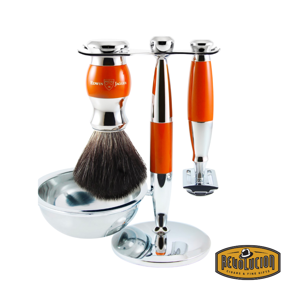 Edwin Jagger 4-piece shaving set with double edge razor and orange-handled synthetic brush.