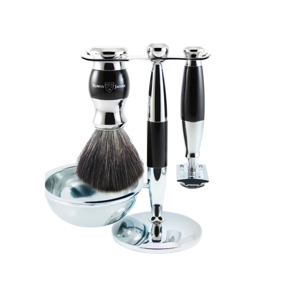 Edwin Jagger 4-piece shaving set featuring a DE razor, synthetic brush, stand, and bowl, all in an elegant ebony finish.
