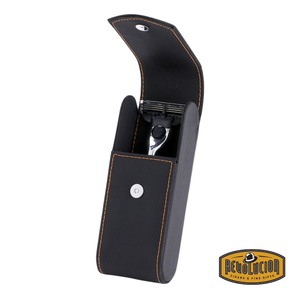 Leather travel case opened, revealing the Edwin Jagger safety razor neatly secured inside with black and orange interior.