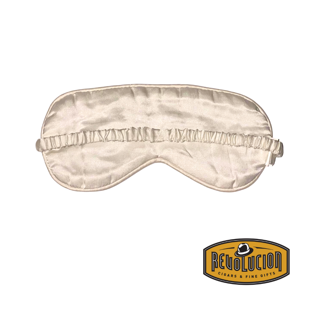 A smooth cream beige sleep mask designed for maximum comfort and effective light blocking, ideal for restful sleep and relaxation.