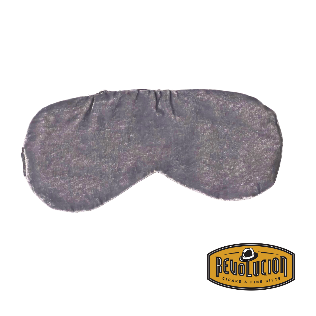 Soft grey sleep mask with a smooth satin-like finish, providing full coverage for a restful sleep.