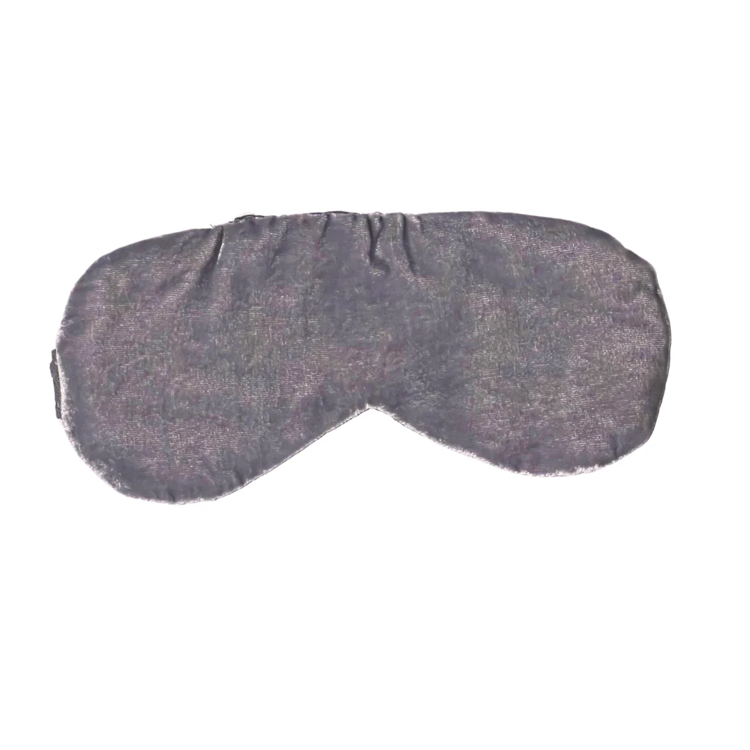 Soft grey sleep mask with a smooth satin-like finish, providing full coverage for a restful sleep.