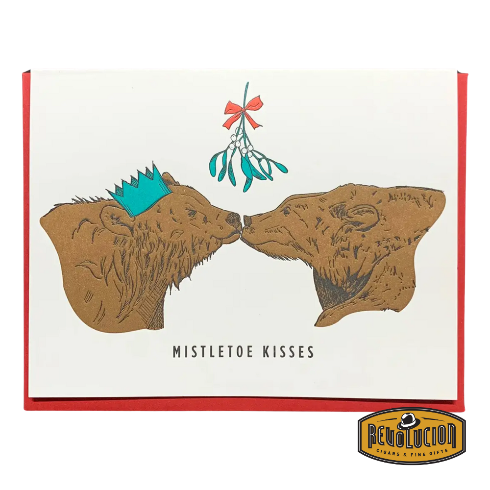 Two grizzly bears under mistletoe, sharing a kiss, one wearing a blue party crown, with the caption “Mistletoe Kisses.”
