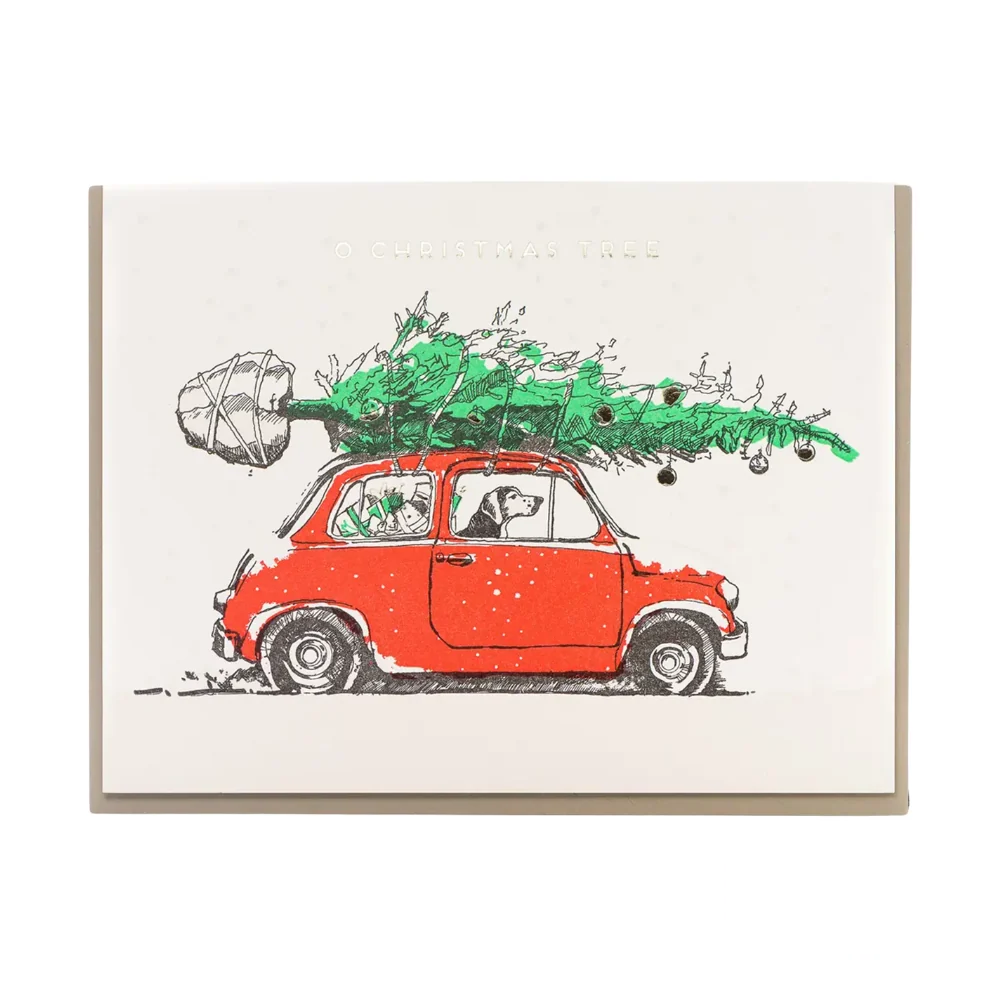 A charming Christmas greeting card featuring an adorable dog playfully tangled in festive tree lights, capturing the joy and humor of the holiday season. The design is heartwarming and perfect for dog lovers celebrating Christmas.