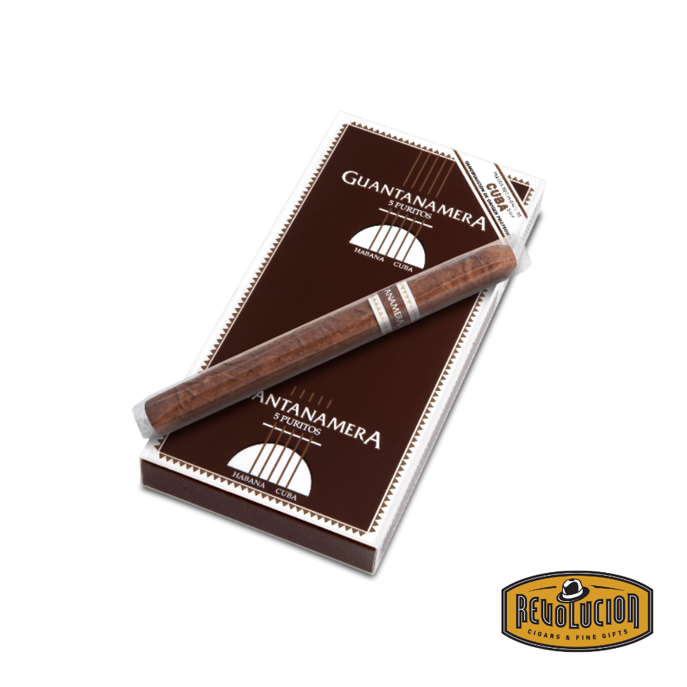 Guantanamera Puritos box with a cigarillo placed in front, showcasing the packaging and product presentation.