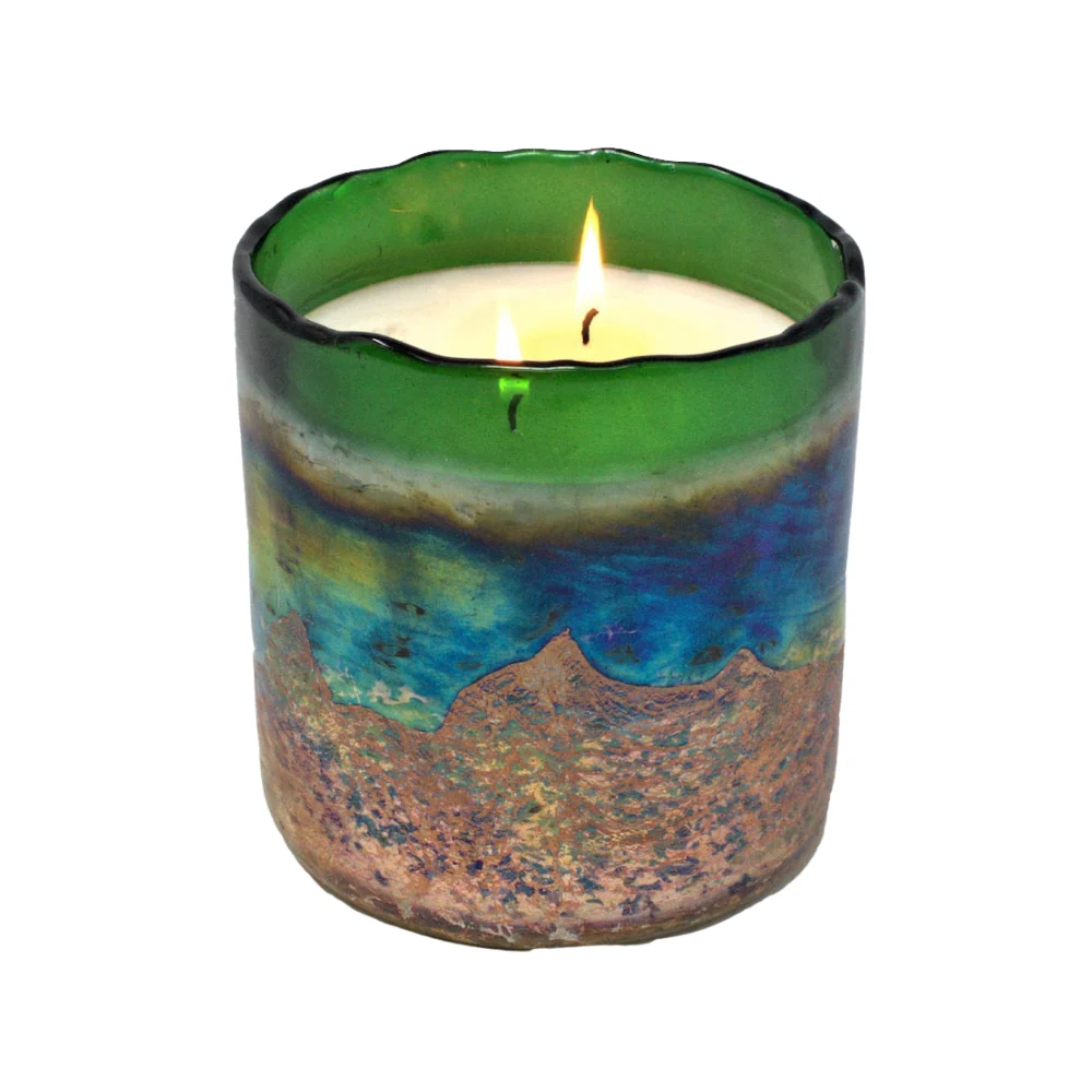 Himalayan Handmade Candles - Horizon Jungle Desert Springs 22OZ, a large artisanal candle in a decorative vessel.