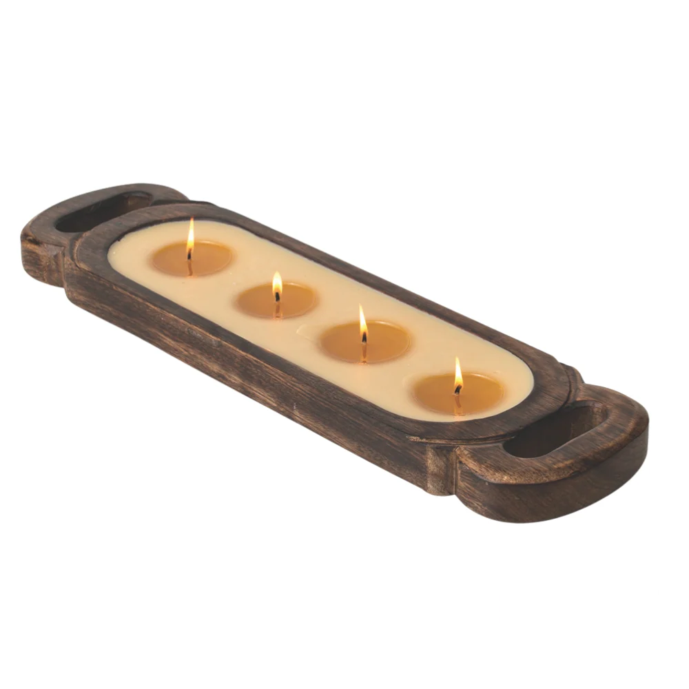Himalayan Handmade Candles - Medium Wooden Tray in Tobacco Bark, a lit candle in a rustic wooden tray with four wicks.
