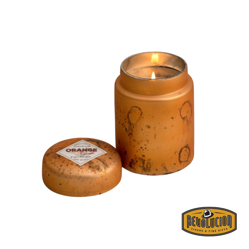 Himalayan Smoke Mountain Fire Glass Lidded Candle – 9oz candle presented in a refined glass jar, capturing the fresh and citrusy fragrance of an orange grove.