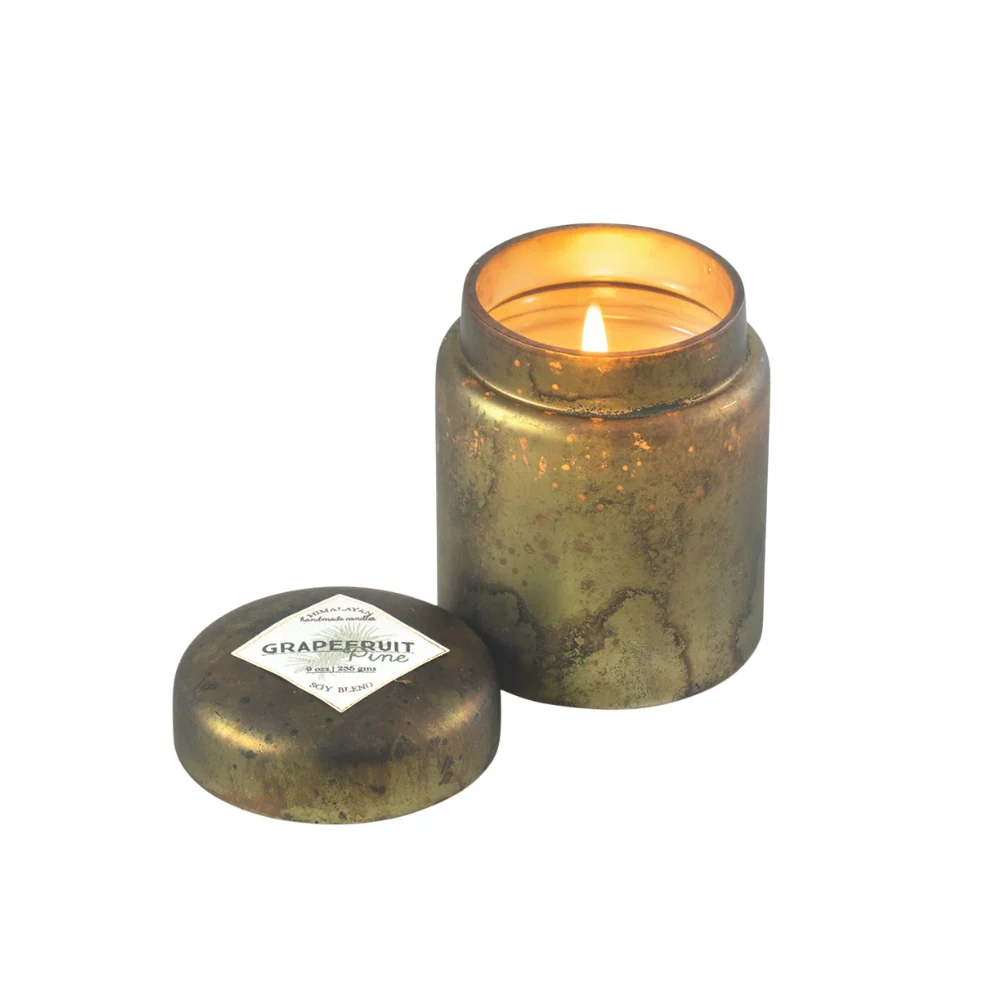 Himalayan Smoke Mountain Fire Glass Lidded Candle – 9oz candle in a sleek glass container, infused with the crisp and invigorating scent of grapefruit and pine.