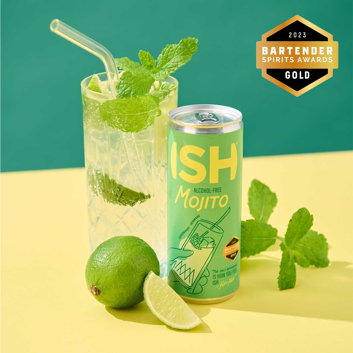 A 250 ml can of ISH Mojito Non-Alcoholic Cocktail placed next to a glass of mocktail, filled with a minty mojito blend and garnished with fresh mint leaves, perfect for alcohol-free enjoyment.