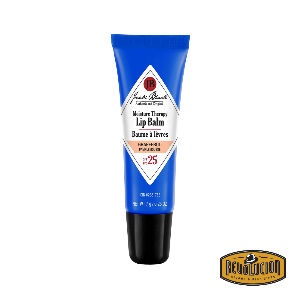 Jack Black Moisture Therapy Lip Balm SPF 25 in grapefruit flavor, shown in a matching blue tube with black cap and bright citrus-themed label detailing.
