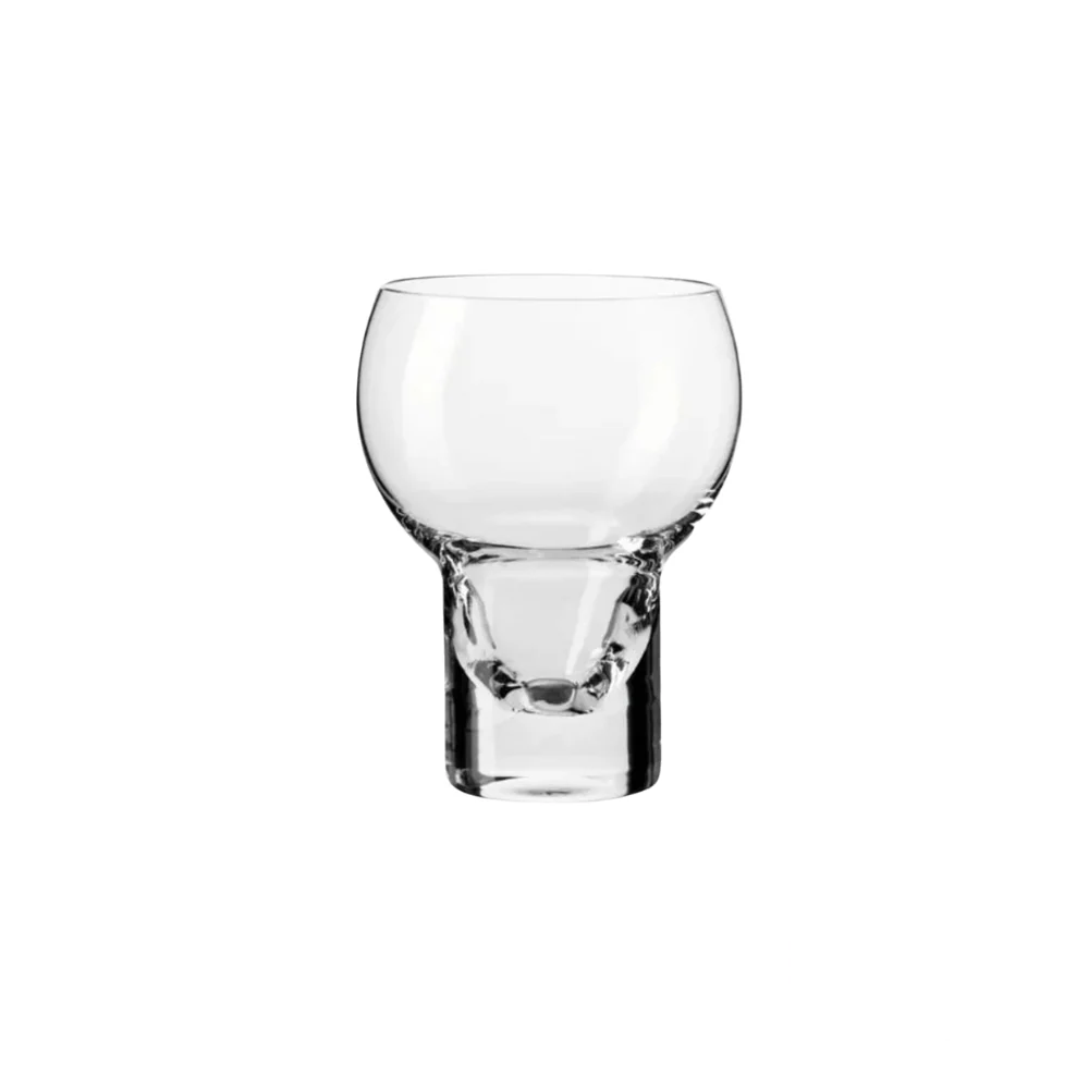 Single glass from the Krosno Shake Collection, showcasing a contemporary design with a round bowl and a sturdy, textured base for a distinctive look.