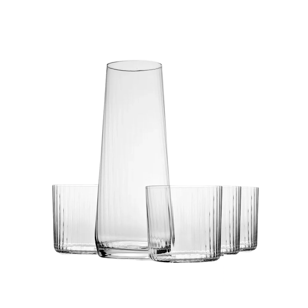 Avant-Garde Lumi Water Set by Krosno, featuring a sleek glass carafe and four matching textured glasses for a sophisticated and modern table setting.