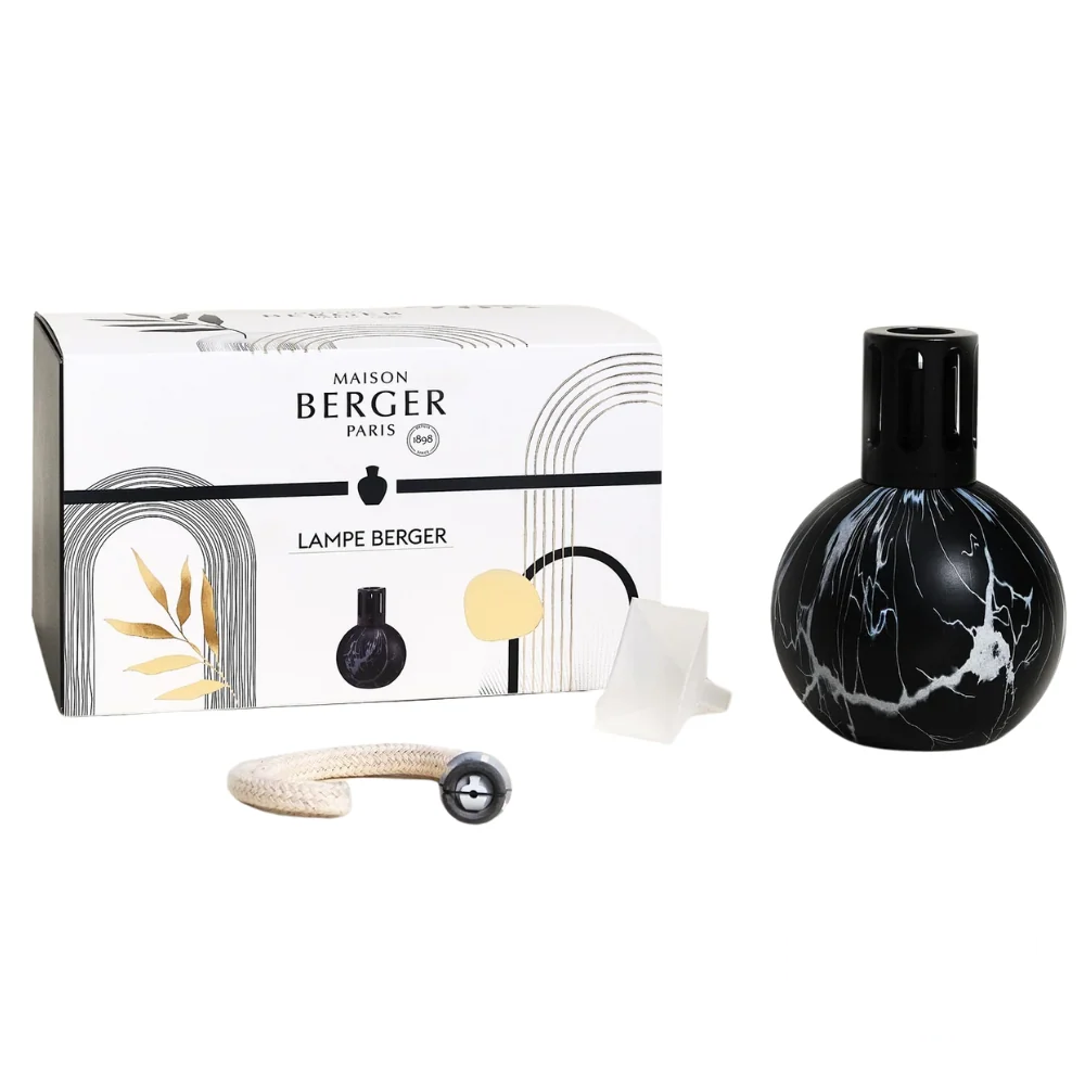 Maison Lampe Berger Marbrure Black Lamp displayed alongside its elegant packaging and included accessories, including the wick, funnel, and decorative box with gold and black design accents.
