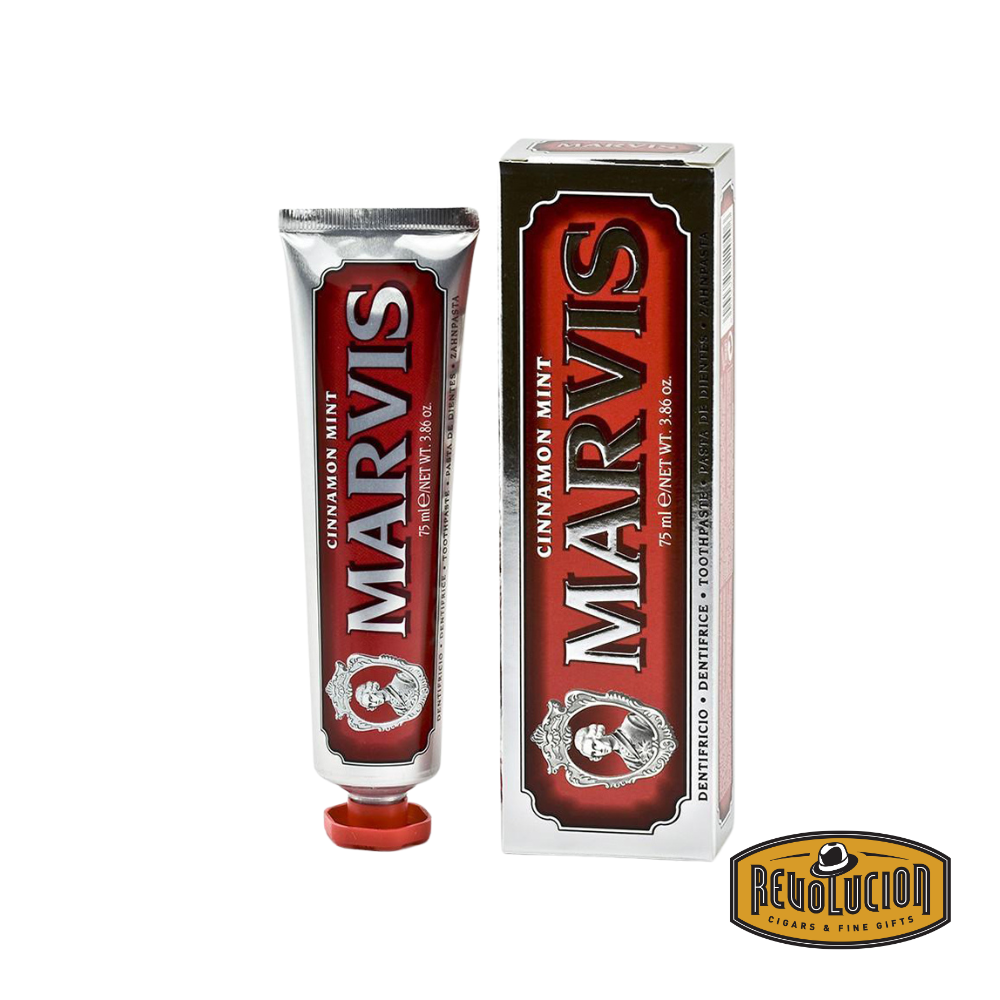 Marvis Cinnamon Mint Toothpaste presented in a vibrant red and silver metallic tube, combining spicy cinnamon warmth with refreshing mint for a bold oral care experience.