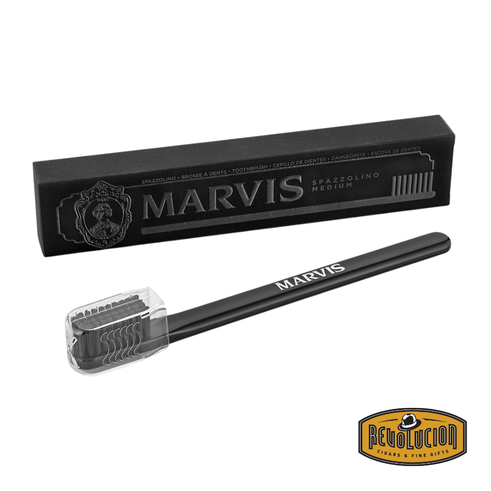 Marvis Toothbrush Black Medium – sleek black toothbrush with a minimalist, classic design and medium bristles, presented against a clean background.