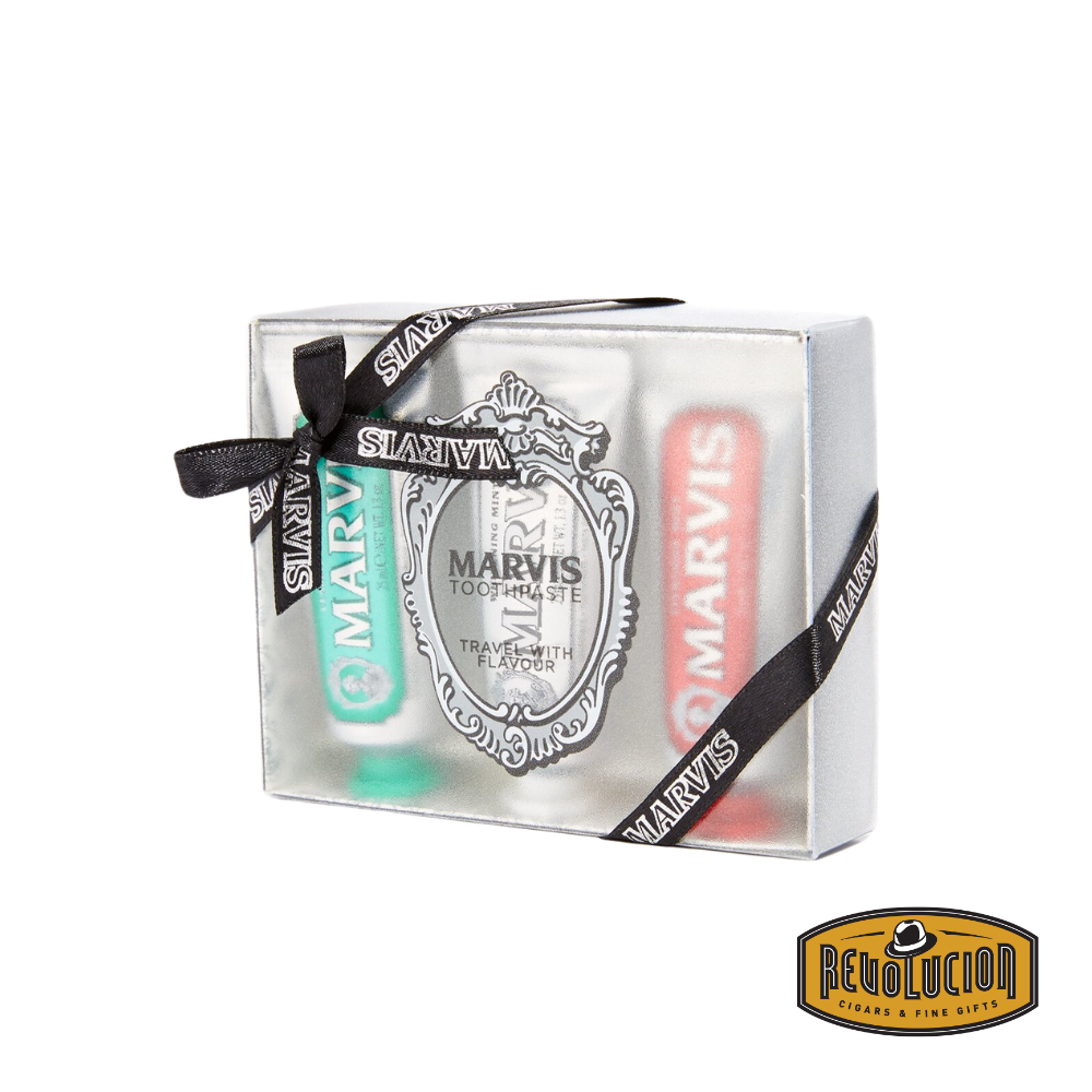 Marvis Travel Size Toothpaste Set, featuring three luxurious toothpaste flavors in a sleek gift box with a decorative ribbon