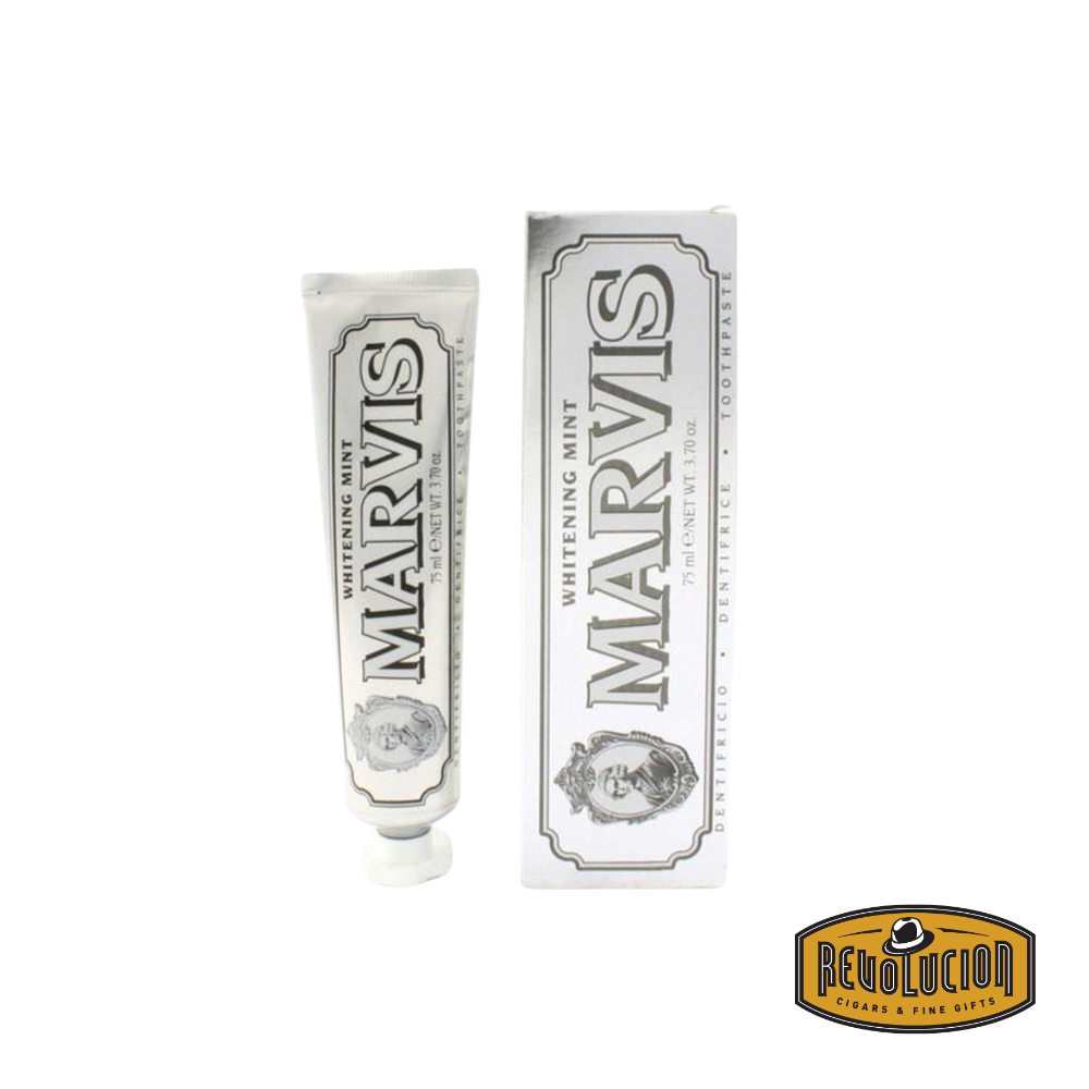 Marvis Whitening Mint Toothpaste in its signature metallic tube with vintage-style labeling, designed to brighten teeth and deliver a refreshing mint flavor.