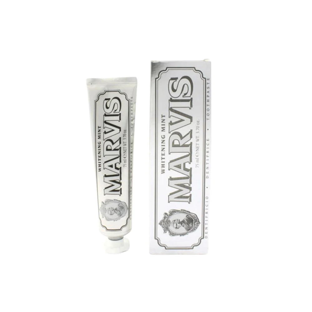 Marvis Whitening Mint Toothpaste in its signature metallic tube with vintage-style labeling, designed to brighten teeth and deliver a refreshing mint flavor.