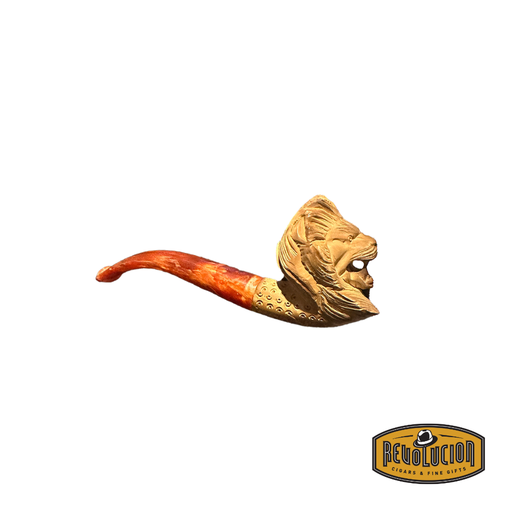 Profile view of a Meerschaum smoking pipe showcasing a detailed lion head carving and a red marbled stem. The bowl has an elegant lattice finish, highlighting the craftsmanship.