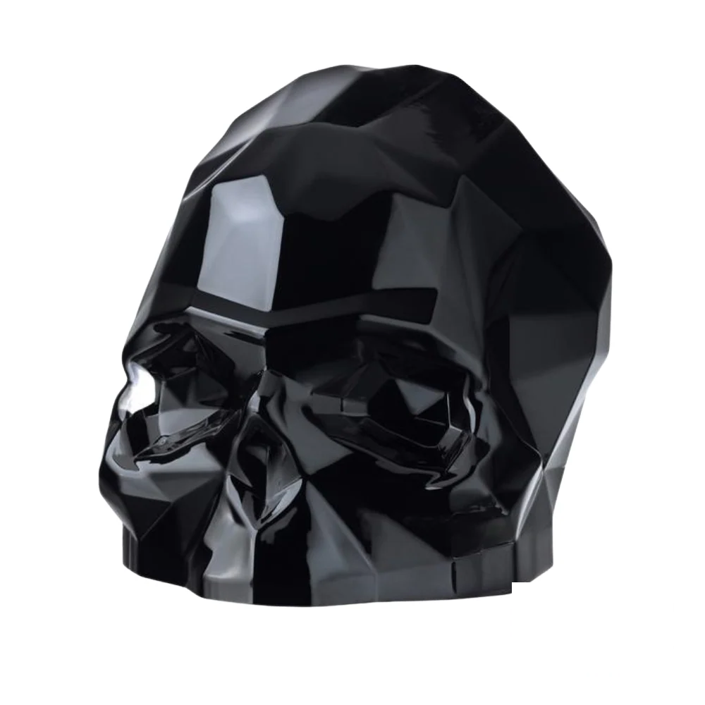 Nude Memento Mori Faceted Skull in Black, with sharp geometric facets and a glossy, deep black finish for a bold, artistic statement.