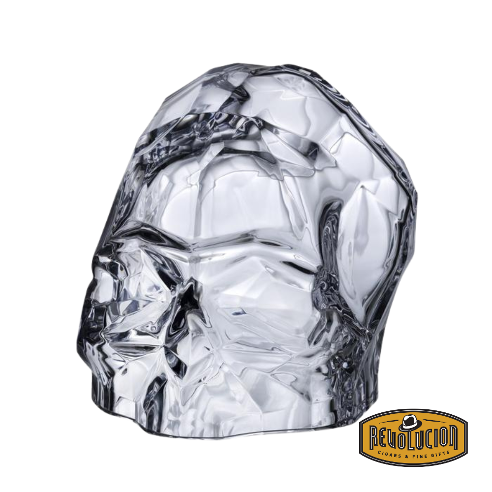 Nude Memento Mori Faceted Skull in Clear Glass, showcasing intricate geometric faceting and smooth, transparent design.