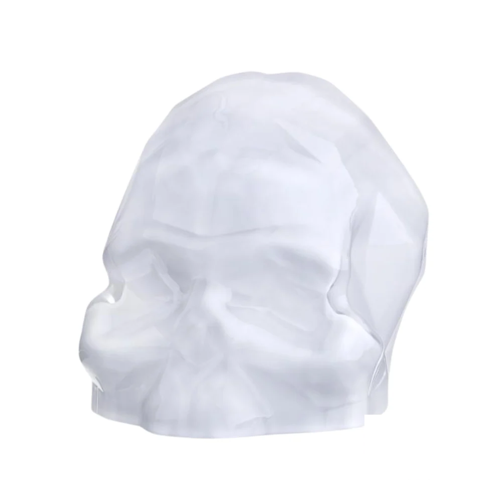 Nude Memento Mori Faceted Skull in White, featuring detailed geometric facets with a sleek matte finish for a modern, minimalist look.