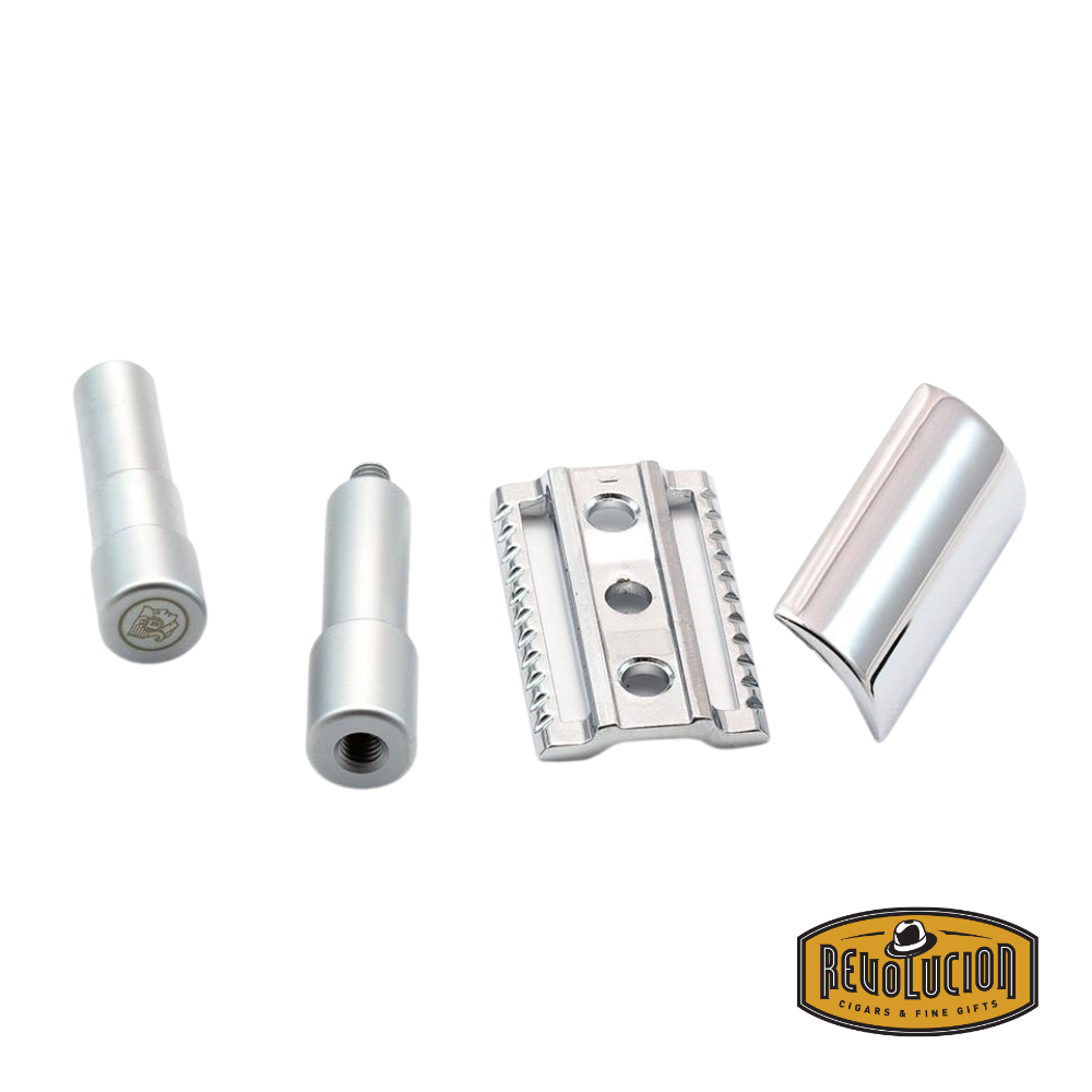 Close-up of the Merkur 46002 three-piece travel razor disassembled, showcasing its chrome finish and compact design.