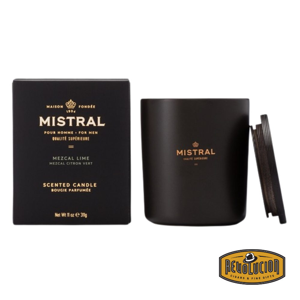 Mistral Mezcal Lime Scented Candle – A luxurious 11oz candle crafted for men, blending the bold essence of mezcal with refreshing lime. Housed in a sleek black jar with gold lettering and accompanied by a wooden lid for a refined touch.
