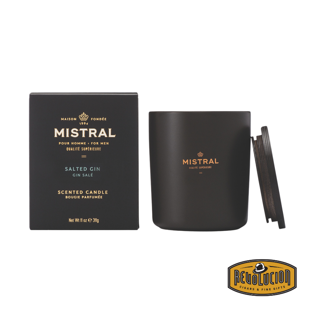 Mistral Salted Gin Scented Candle – An 11oz luxury candle designed for men, featuring a refined fragrance inspired by salted gin. Encased in a sleek black vessel with gold lettering, it includes a matching wooden lid for an elegant touch.