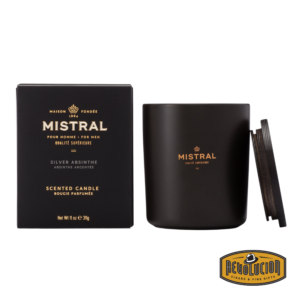 Mistral Silver Absinthe Scented Candle – A premium 11oz candle with a bold and mysterious fragrance, blending the herbal depth of absinthe with silver-fresh notes. Encased in a matte black jar with gold detailing and a refined wooden lid.