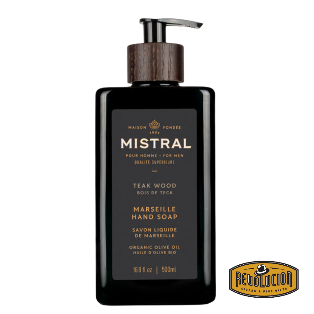 Mistral Hand Soap 16.9FL – Teak Wood – an elegant amber-colored bottle with a pump top, showcasing refined design and earthy sophistication.