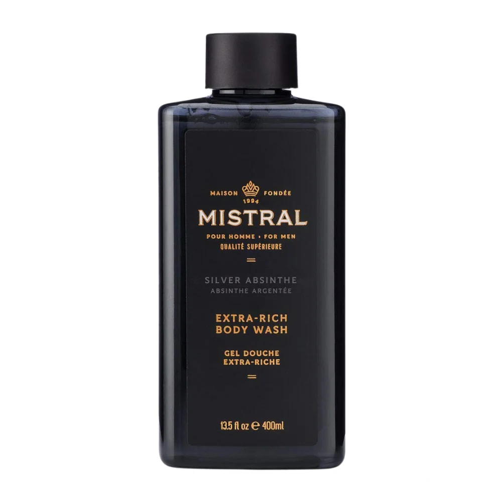 Mistral Men's Extra Rich Body & Hair Wash in Silver Absinthe scent, shown in a bold, metallic-inspired bottle with cool green accents and an avant-garde design.